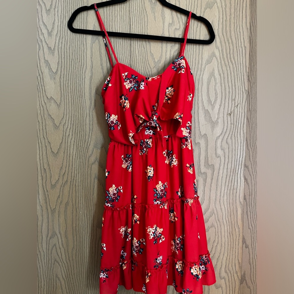 Midi dress red with flowers all over. Bow like over top. Size small.
